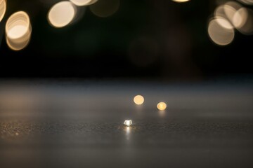 Bokeh of night shot, road, street lights, transportation abstract in city. Beautiful blurry colored lights. Random circular geometry. Horizontal, speed bokeh light background