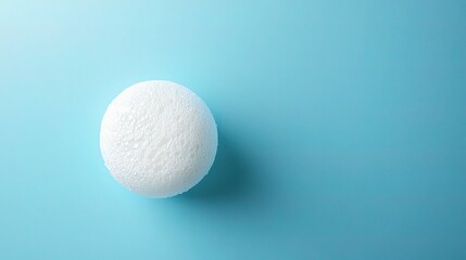 Glistening Soap Bubble Floating Gracefully on Blue Background