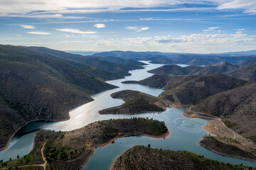 Amazing abstract landscape of Sabor lake, Tras os Montes  Portugal. Drone vision, aerial view of Serpente do Medal, Sabor River, tourist attraction and travel destination in Northern Portugal.