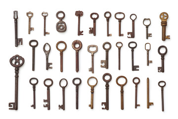 Collection of different old vintage keys isolated on white background