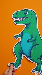 Obraz premium Hand-drawn dinosaur silhouette in vibrant colors against an orange backdrop fun contemporary art collage depicting creativity imagination and fantasy