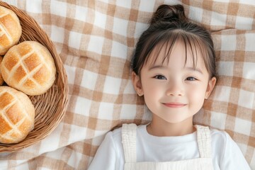 Serene Family Picnic Asian Girl Enjoying Board Games with Bread on Plaid BlanketMindful Lifestyle and Tech-Free Parenting Visuals for Blogs and Content Marketing