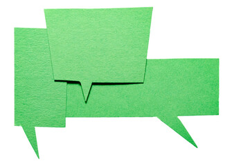 Green blank cut out cardboard paper speech bubbles with rough edges and copy space for text on...