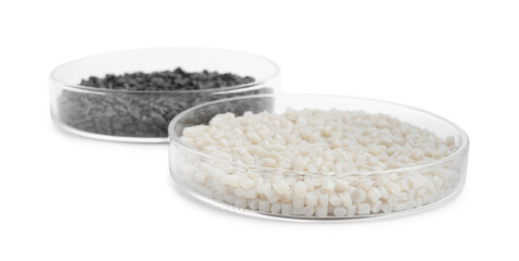 Colorful plastic granules in petri dishes isolated on white