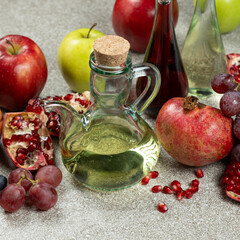 Vinegar in a glass vinegar bowl with a spout on a black background.