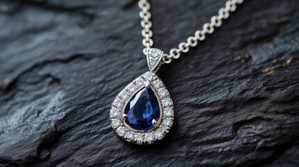 Elegant pendant necklace with a teardrop-shaped sapphire surrounded by small diamonds, white gold chain, generative ai