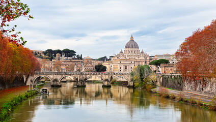 Panorama of St. Peter's Basilica,  Sant Angelo bridge and Tiber river in autumn day in Rome, Italy....