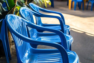 Blue plastic chairs at the tribune football stadium.
