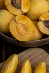 ripe soft apricot fruits on the cutting board