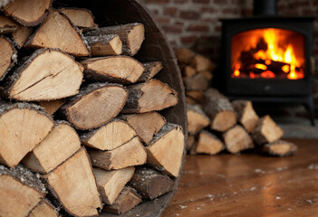 Pile of firewood for fireplace at home near the stove