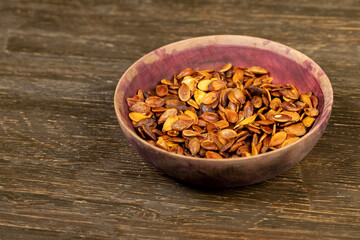 ripe pumpkin seeds fried to brown and golden