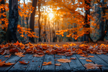 Beautiful autumn scene with a wooden bridge and a view of the mountains. The sun is setting, casting a warm glow over the landscape. The leaves on the ground are orange and brown, creating a serene