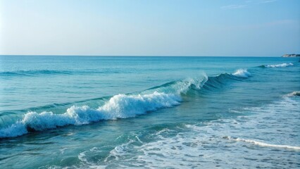 Blue hues dominate the ocean scene as a gentle wave breaks at the shore, shore, horizon, natural light