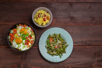 Jewish food tzimmes, chelnt, shakshuka for the holiday. Horizontal