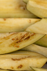 the flesh and seeds of sliced ripe eggplant