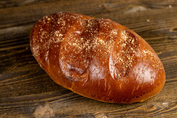 a soft loaf of wheat flour on the table