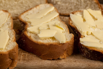 a soft loaf of wheat flour with butter on the table