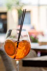 Aperol Spritz cocktail on the summer terrace in cafe