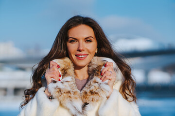 Young woman city portrait on sunny winter day