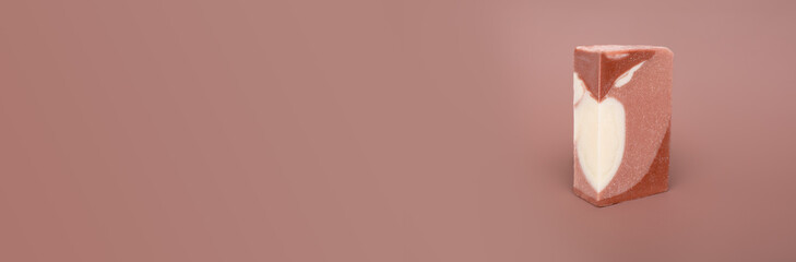  Natural multi-colored solid handmade soap a mocha mousse background. Eco-friendly natural handmade cosmetics. Natural spa products and decor for bath.Color 2025