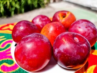 fresh ripe plums on a background

