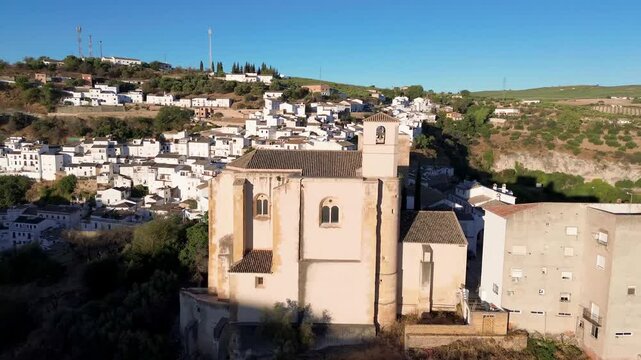 Drone view of Church of Our Lady of the Incarnation, in Setenil de las Bodegas, Cadiz, Andalusia, Spain.