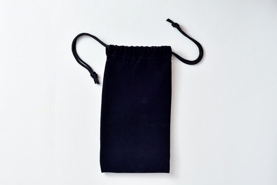 Black velvet pouch isolated on white background