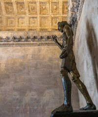 In the Temple of Jupiter, the baptistery is today dominated by a sculpture of St. John the Baptist....