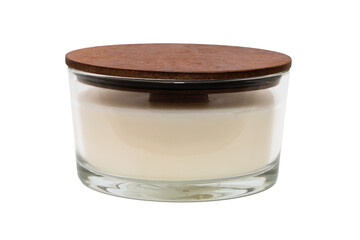 The picture can be used for interior decoration pictures. Candle in glass with wooden cap. The candle is on a white background. No label.