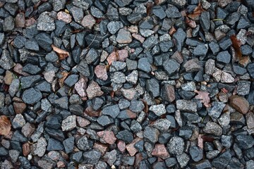 Small rocks pattern and texture background. Tiny stones gravel background.
