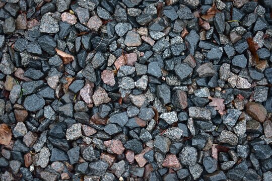 Small rocks pattern and texture background. Tiny stones gravel background.