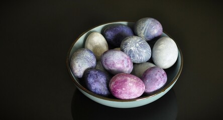 Easter eggs. Multi colored. Organized in a bowl. Colorful image, pastel colors, handmade decorations