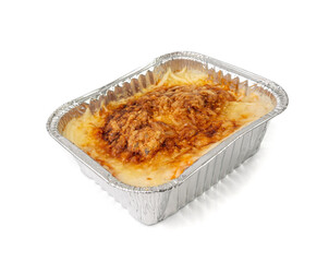 Lasagna portion in aluminium foil tray isolated. Oven baked lasagne for heating, container, airplane food