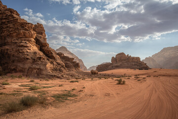Desert Landscape of Wadi Rum in the Middle East. Beautiful Scenery of Sandy Surface with Rocky Formations in Southern Jordan.