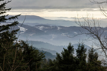 View from the Hornisgrinde mountain near Sasbach in the Black Forest into the valley, in winter...