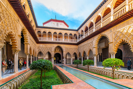 The inner courtyard with water feature at the Mudejar garden in the Royal Alc&aacute;zar of Seville, also knows as al_Qasr al-Muriq.