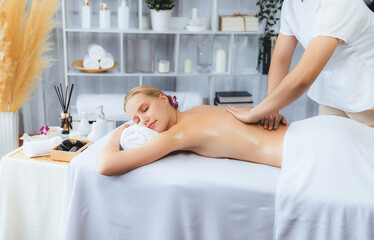 Caucasian woman customer enjoying relaxing anti-stress spa massage and pampering with beauty skin...