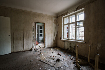Interior of domestic room of abandoned forsaken apartment house