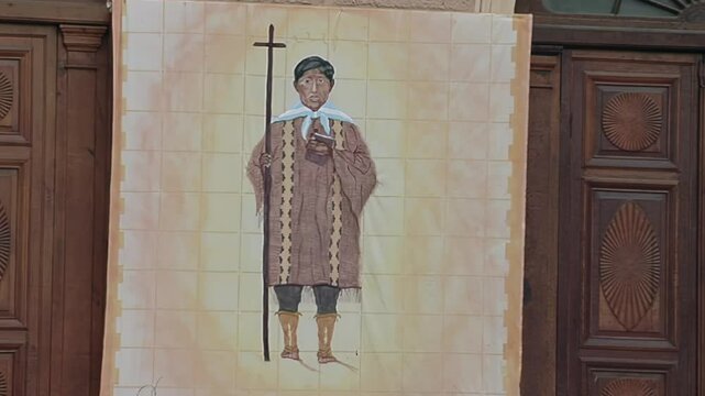 Faith and Art: Painted Altar Server at the Entrance of Our Lady of Rosary Cathedral in Cafayate, Salta Province, Argentina