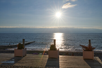 Russia. Adler. January sun over the city beach
