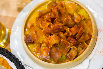 Orejas a la gallega - spanish dish. Roast pigs ears with spice