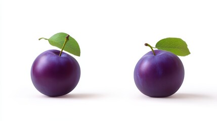 Two fresh purple plums with leaves on white background