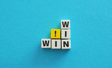 Cubes with the phrase win win. Collaboration and mutual success.