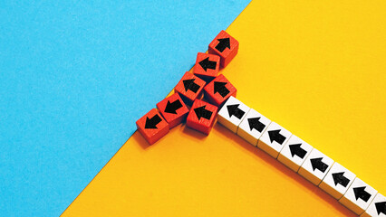 A line of arrows breaking apart. Symbol of disruption and challenges.