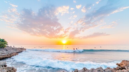 Obraz premium Sunset surfers ride waves on tropical beach