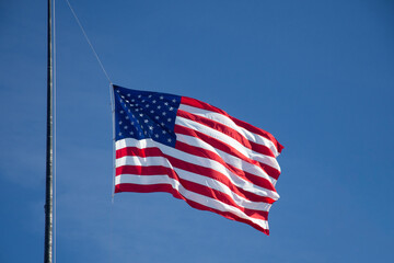 Fototapeta premium American Flag Waving in the Wind.