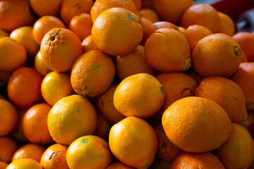 Closeup view on oranges on the market. High quality photo