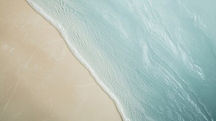 Soft waves gently lapping against the sandy shore of a tropical beach create a tranquil, serene atmosphere, inviting relaxation and escape in a picturesque paradise