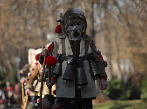 The Surva masquerade games festival in Sofia, Bulgaria. People called Kukeri parade in masks and ritual costumes, perform ritual dances to drive away evil spirits in Sofia, Bulgaria