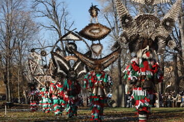 The Surva masquerade games festival in Sofia, Bulgaria. People called Kukeri parade in masks and ritual costumes, perform ritual dances to drive away evil spirits in Sofia, Bulgaria